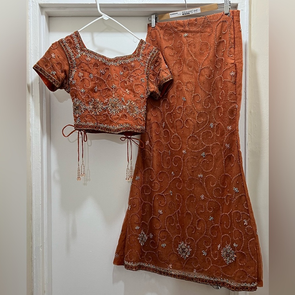 Elegant orange beaded lehenga skirt with blouse and dupatta
